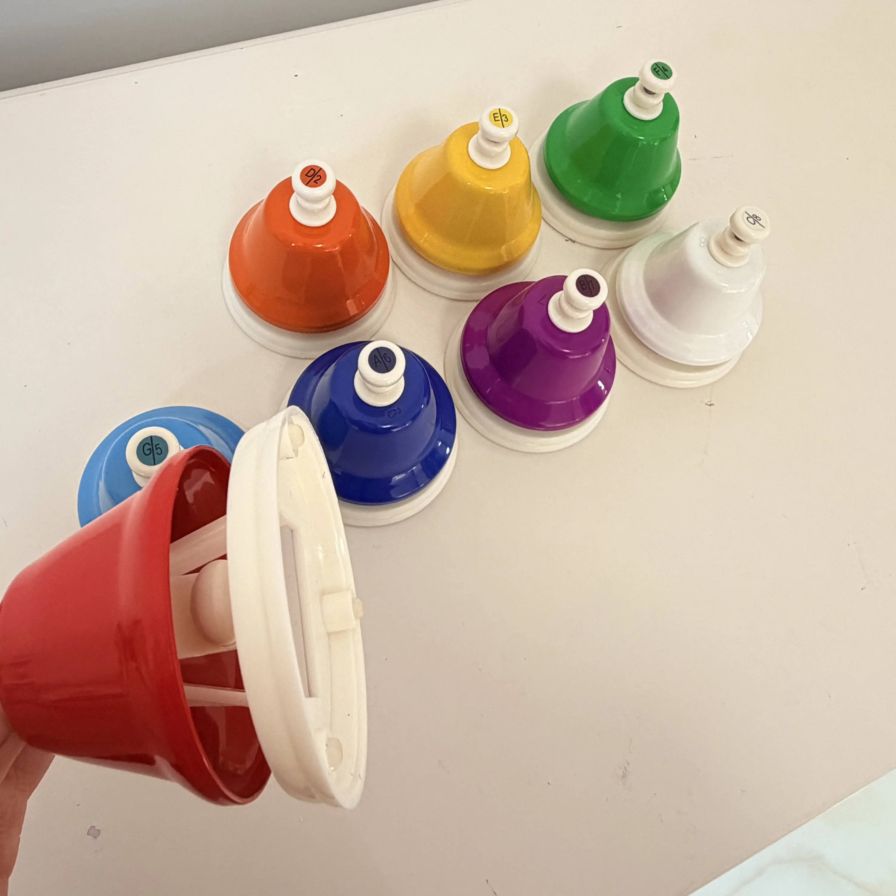 Press hand bells